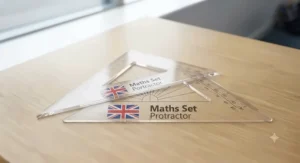 A pair of plastic 45-degree and 60-degree set squares used for technical drawing and key stage maths.