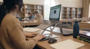 Side profile showing multiple angle adjustments on a sturdy laptop stand for optimal viewing comfort in lectures