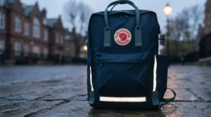 Reflective strips on a school backpack to ensure visibility for Year 7 pupils walking to school during dark winter mornings.