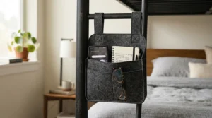 Compact storage solutions for halls of residence with a bedside caddy hanging off a single bed frame